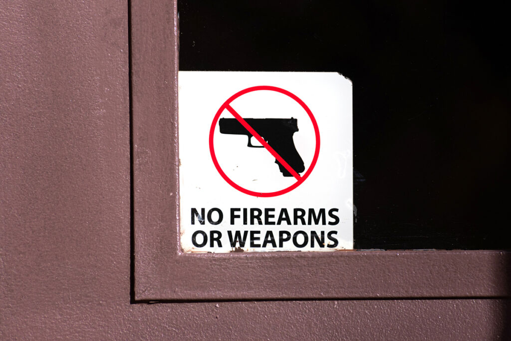 Gun Free Zone No Guns Sign iStock 1295573667