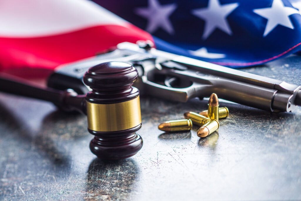 Gavel Gun US Flag iStock 1055139516 1536x1024 (1)